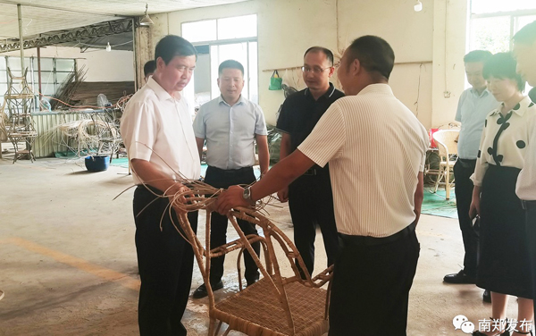 屈占权来我区调研非遗保护传承发展工作